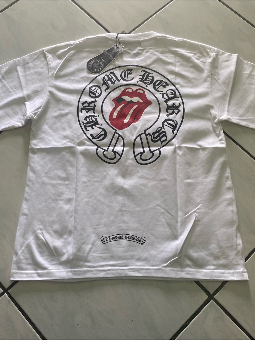 Comme des Garcons White Graphic Tee with Red Tongue Logo